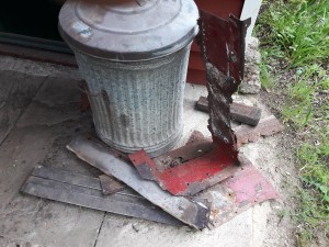 This pile of scrap in front of the dustbin is pretty much all that remained of the original entrance steps. 